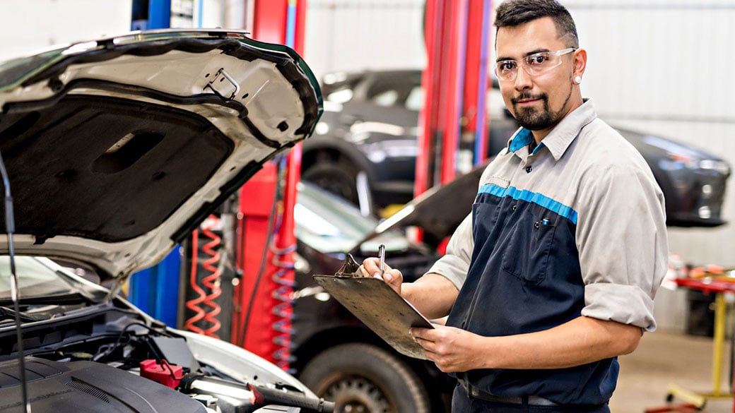 AUTO-Mechanic-Job-in-Uniform-Working-on-Car-1219.jpg