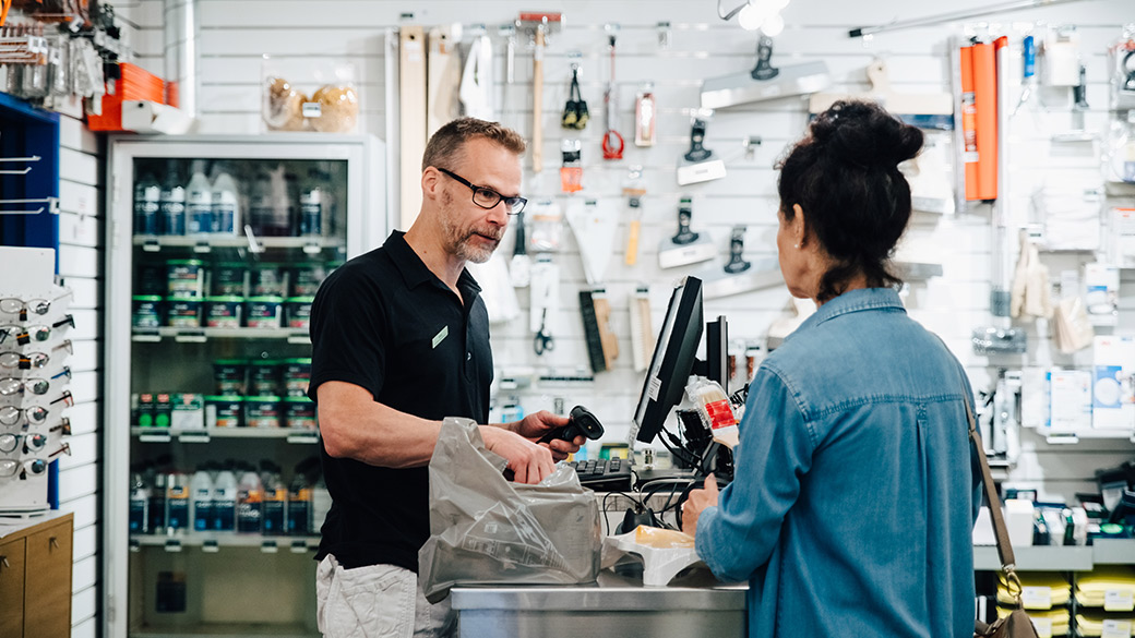 customer-and-shop-owner-at-checkout-counter.jpg