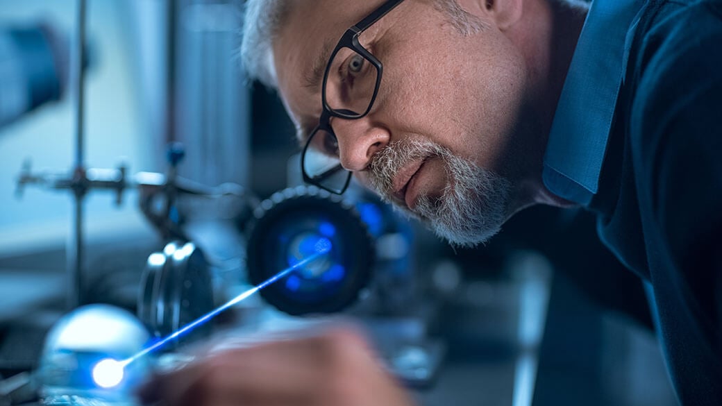 engineer-working-with-high-precision-laser.jpg