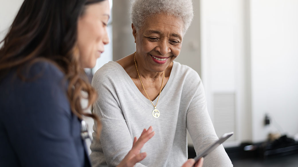 Epicor-Young-Doctor-with-Elderly-Patient.jpg