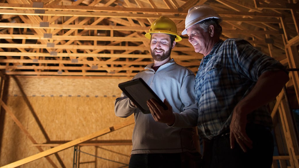 men-with-digital-tablet-at-building-site.jpg